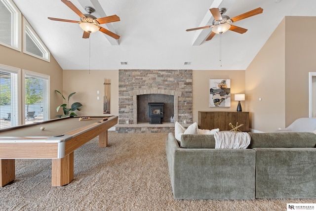 S-1007 Shady Ln, Fremont, NE 68025 - rec room featuring ceiling fan, a wood stove, carpet flooring, high vaulted ceiling, and billiards table