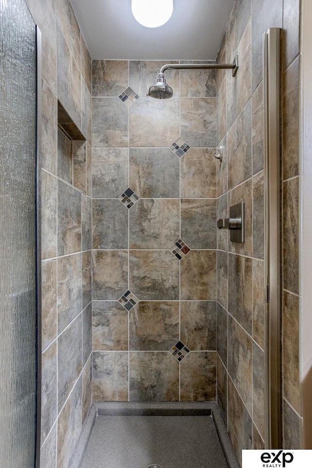 full bathroom with a shower stall