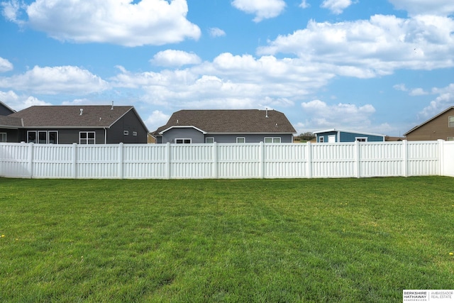 view of yard featuring fence