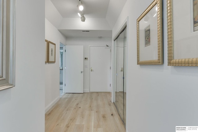 hallway featuring wood finished floors