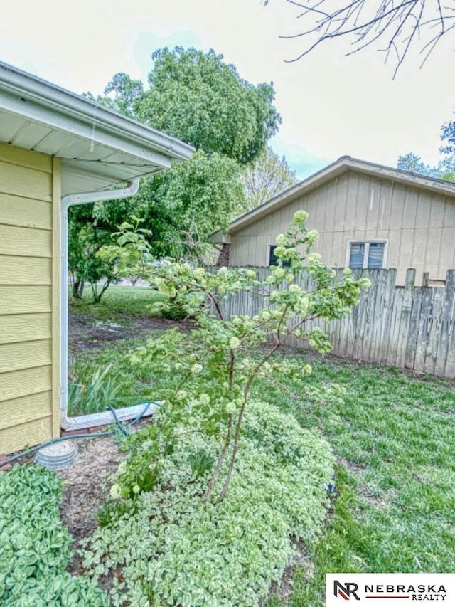 view of yard featuring fence