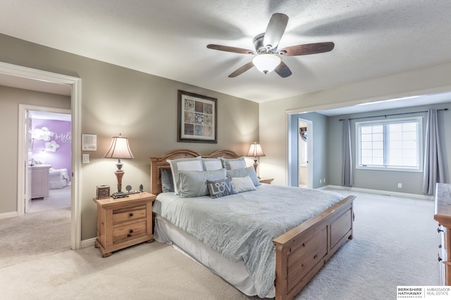 bedroom featuring a ceiling fan, baseboards, and light colored carpet