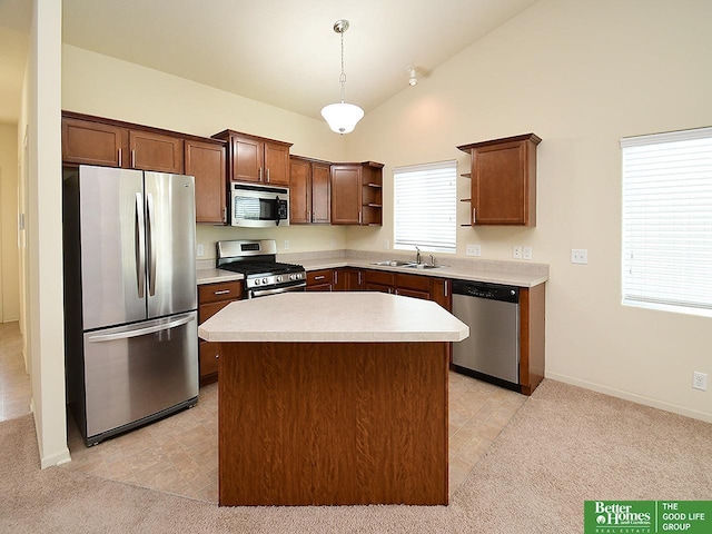 kitchen with open shelves, a sink, light countertops, stainless steel appliances, and decorative light fixtures