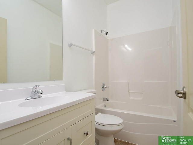 bathroom featuring vanity, bathing tub / shower combination, and toilet