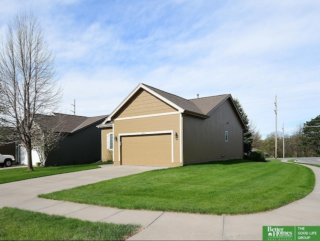 view of home's exterior featuring a yard, concrete driveway, and a garage