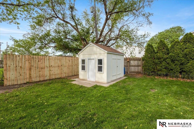 view of shed featuring a fenced backyard