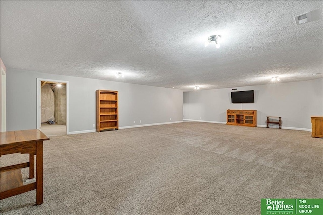 7714 S 167th St, Omaha, NE 68136 - finished basement with baseboards, a textured ceiling, and carpet