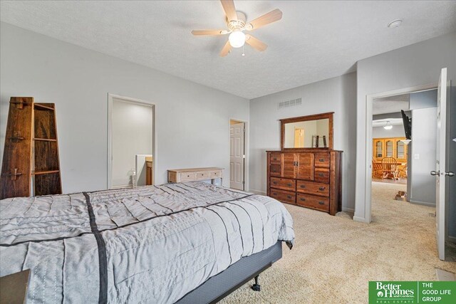 7714 S 167th St, Omaha, NE 68136 - bedroom with visible vents, a textured ceiling, carpet floors, and ceiling fan