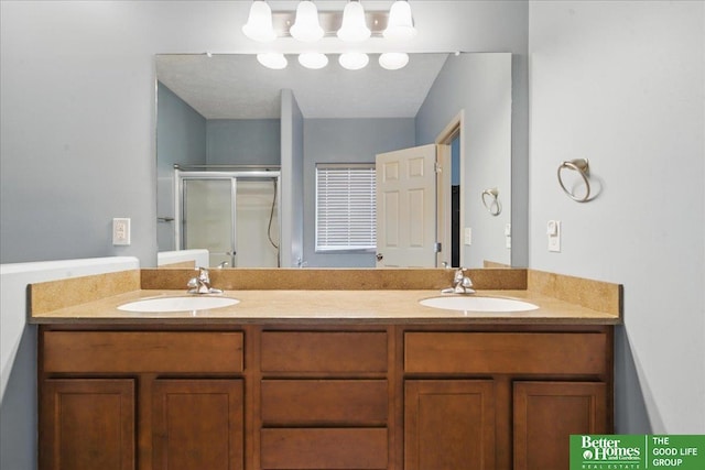7714 S 167th St, Omaha, NE 68136 - bathroom with double vanity, a sink, and a stall shower