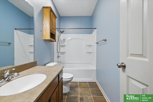 7714 S 167th St, Omaha, NE 68136 - full bathroom with stone finish flooring, shower / tub combination, vanity, baseboards, and toilet