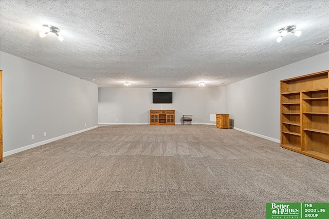 7714 S 167th St, Omaha, NE 68136 - finished basement featuring baseboards, carpet, and a textured ceiling