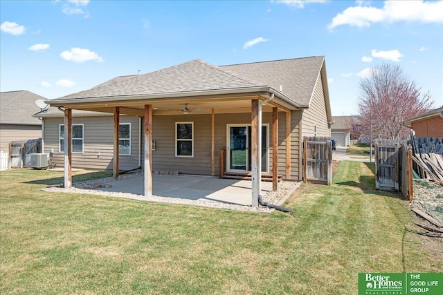 7714 S 167th St, Omaha, NE 68136 - rear view of house featuring a yard, a patio, fence, and central AC unit
