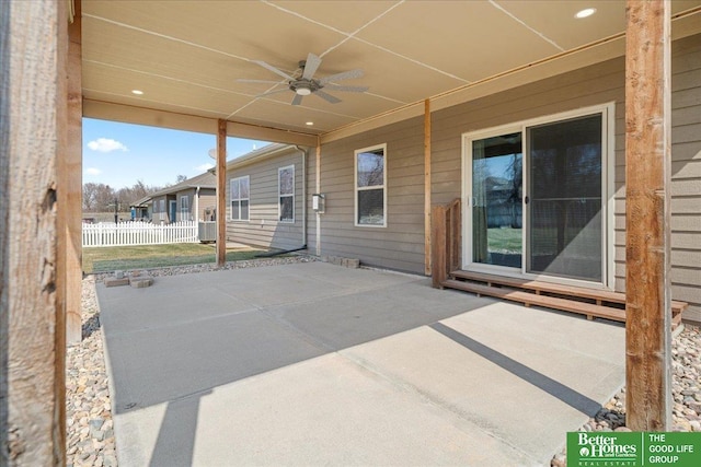 7714 S 167th St, Omaha, NE 68136 - view of patio / terrace featuring central air condition unit, ceiling fan, and fence