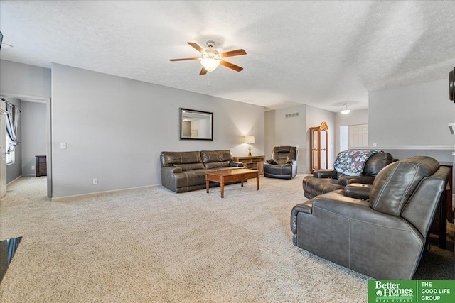 7714 S 167th St, Omaha, NE 68136 - living area with visible vents, carpet flooring, a textured ceiling, and ceiling fan