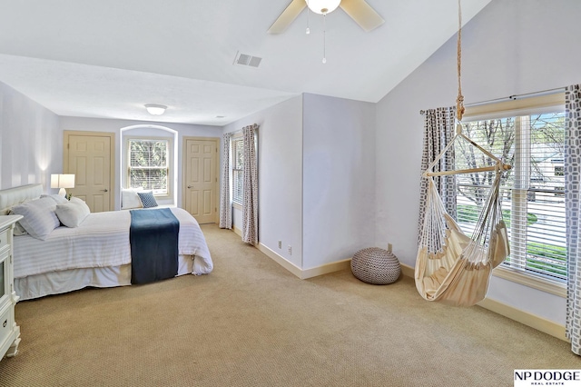 bedroom featuring visible vents, a ceiling fan, baseboards, and light colored carpet