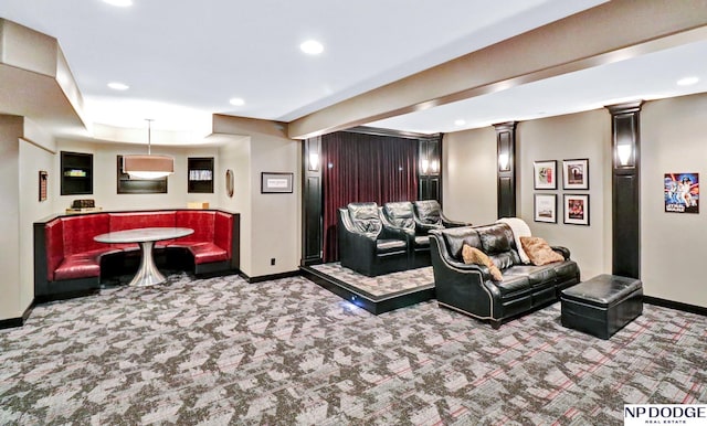 carpeted cinema room featuring baseboards, recessed lighting, and ornate columns