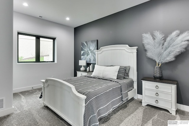 carpeted bedroom with recessed lighting, baseboards, and visible vents
