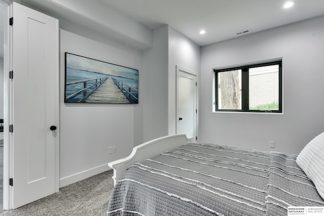 bedroom featuring recessed lighting, baseboards, visible vents, and carpet
