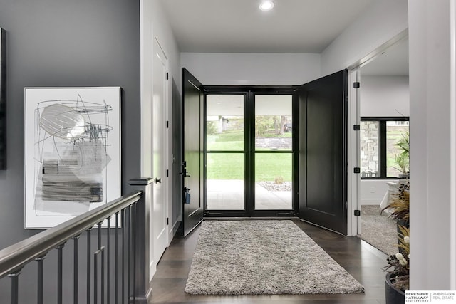 entrance foyer with dark wood-type flooring and recessed lighting
