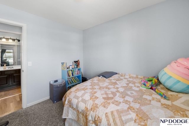 bedroom featuring baseboards and carpet flooring