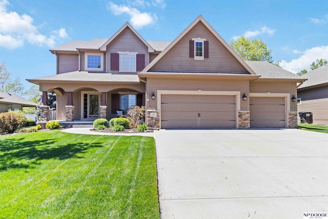 craftsman inspired home featuring covered porch, concrete driveway, a front lawn, and stone siding