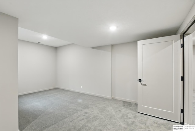 finished basement featuring recessed lighting, carpet flooring, and baseboards