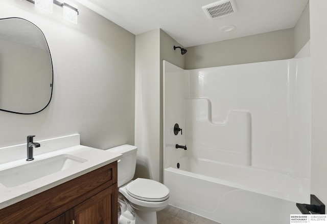 bathroom with vanity, toilet, tile patterned floors, shower / bath combination, and visible vents