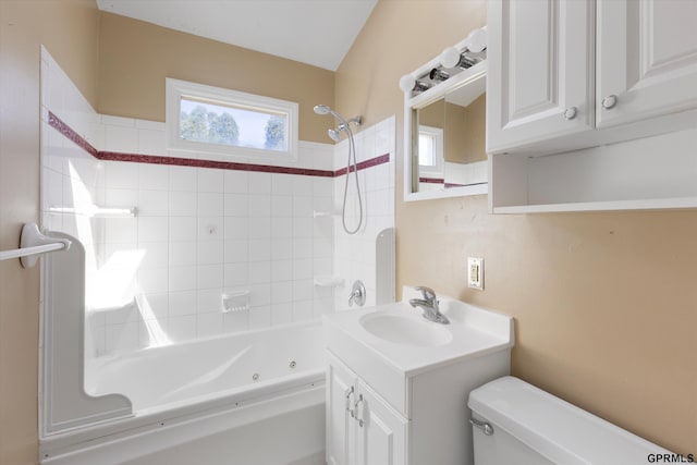 bathroom with vanity, shower / bathing tub combination, and toilet