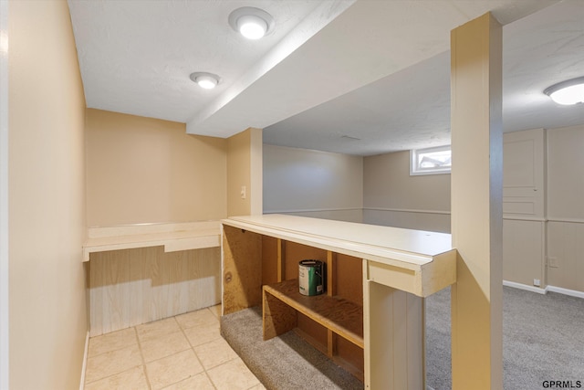 bar featuring baseboards