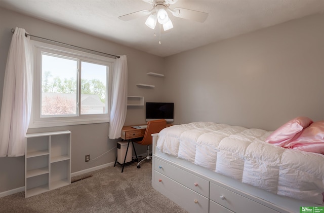 bedroom with baseboards, ceiling fan, carpet, and visible vents