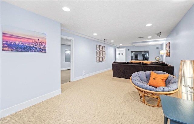 living room featuring baseboards, carpet flooring, and recessed lighting
