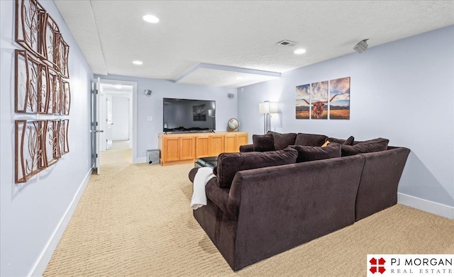 living room featuring light colored carpet, a textured ceiling, recessed lighting, baseboards, and visible vents