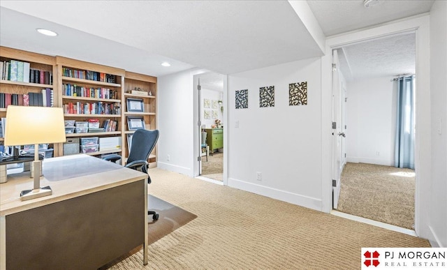 office with baseboards, recessed lighting, carpet, and a textured ceiling