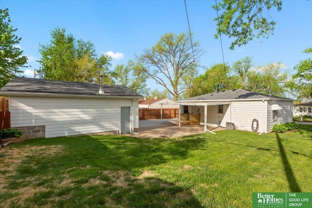 view of yard featuring fence and a patio area