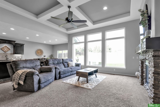 living area with recessed lighting, carpet, ceiling fan, and coffered ceiling