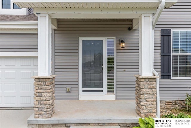 8230 Kilpatrick Pkwy, Bennington, NE 68007 - doorway to property with covered porch