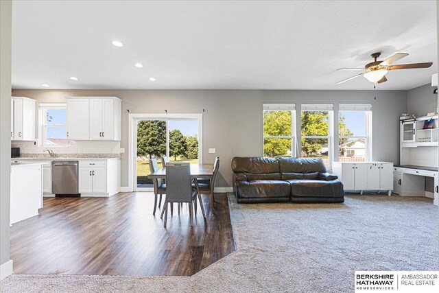 8230 Kilpatrick Pkwy, Bennington, NE 68007 - dining room featuring ceiling fan, recessed lighting, baseboards, and wood finished floors