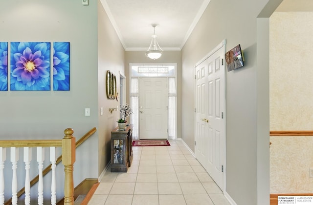 11402 Todd Dr, Blair, NE 68008 - foyer featuring light tile patterned flooring, baseboards, and crown molding