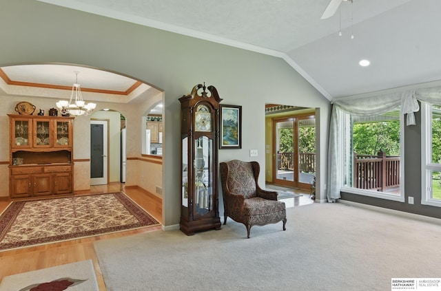 11402 Todd Dr, Blair, NE 68008 - sitting room with arched walkways, crown molding, lofted ceiling, baseboards, and ceiling fan