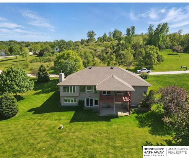 11402 Todd Dr, Blair, NE 68008 - back of property with a yard, a chimney, and a wooden deck