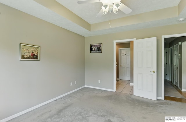11402 Todd Dr, Blair, NE 68008 - unfurnished bedroom with carpet, baseboards, and a ceiling fan