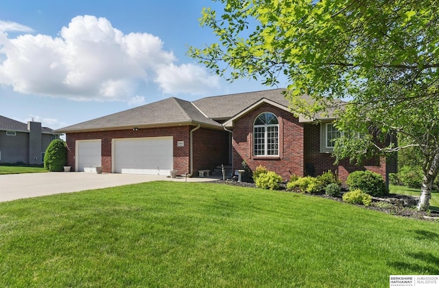 11402 Todd Dr, Blair, NE 68008 - ranch-style house with concrete driveway, a front yard, an attached garage, brick siding, and a shingled roof