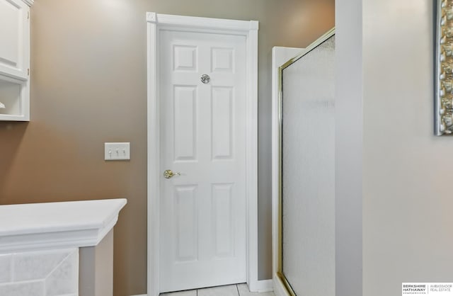 11402 Todd Dr, Blair, NE 68008 - bathroom featuring a stall shower and tile patterned floors