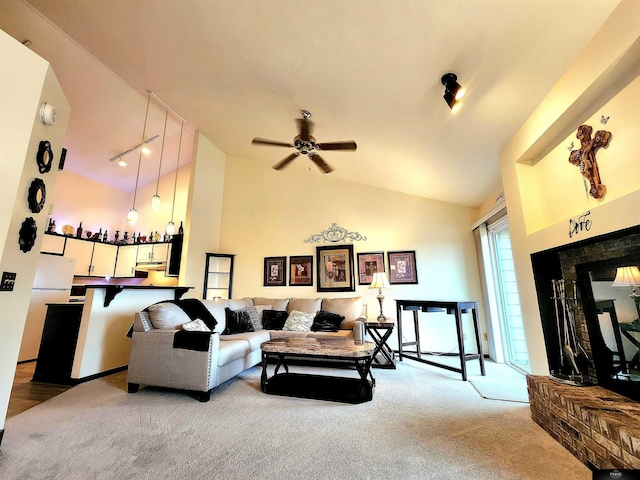 living room with carpet floors, a ceiling fan, high vaulted ceiling, and a dry bar