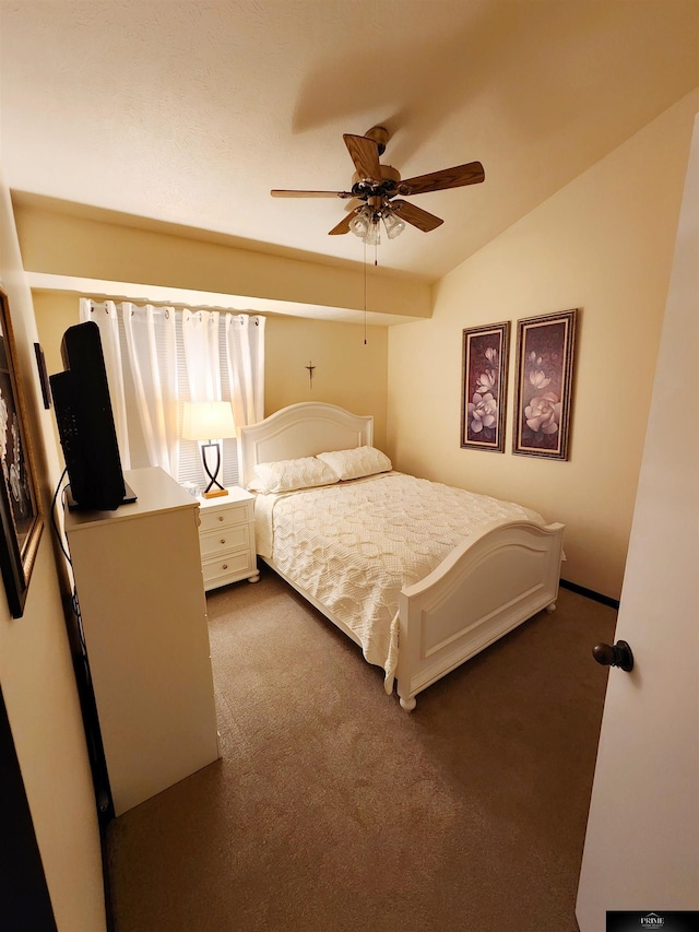 carpeted bedroom featuring ceiling fan and lofted ceiling