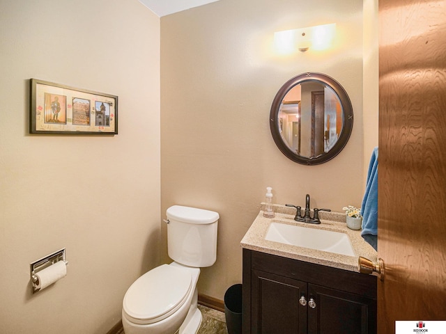 1521 Kingston Rd, Lincoln, NE 68506 - half bathroom with toilet, baseboards, and vanity