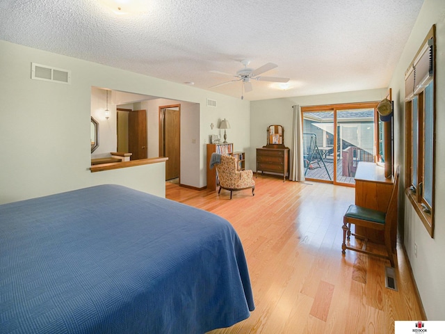 1521 Kingston Rd, Lincoln, NE 68506 - bedroom featuring visible vents, access to outside, and light wood-type flooring