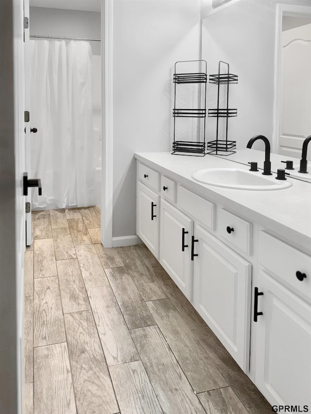 18063 Jones St, Elkhorn, NE 68022 - full bath with vanity and wood finished floors