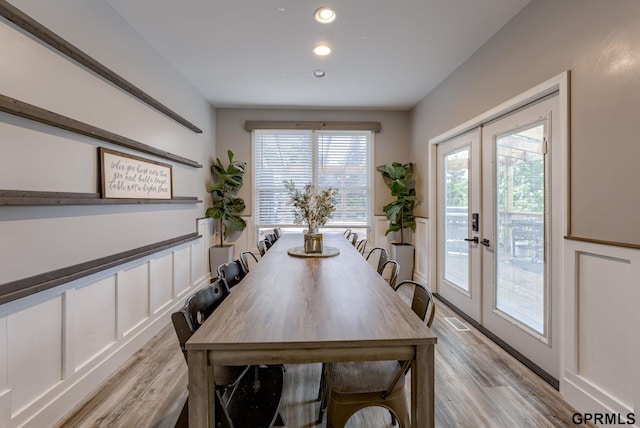 18063 Jones St, Elkhorn, NE 68022 - dining room with french doors, recessed lighting, light wood-style flooring, and visible vents
