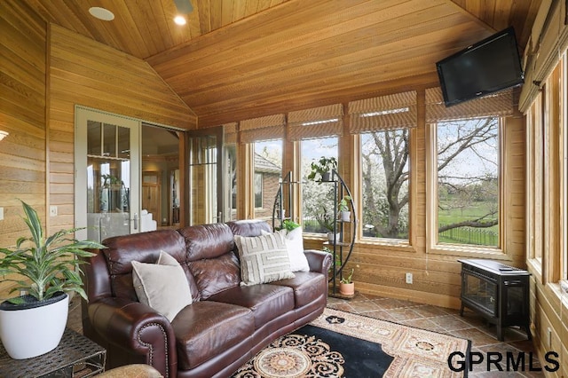 sunroom with a wood stove